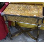 An ornate French walnut and ormolu mounted fold ov