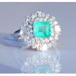 An 18ct white gold Colombian emerald and diamond c