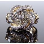 A large gent's diamond encrusted knot ring, total