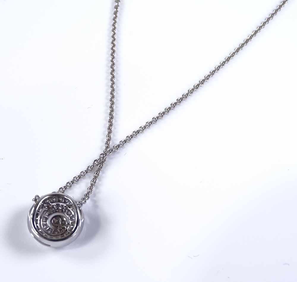 An 18ct white gold diamond swirl pendant, on 18ct - Image 4 of 4