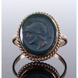 An unmarked gold bloodstone seal ring, depicting a