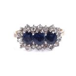 A 9ct gold sapphire and diamond cluster ring, sett