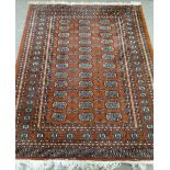 A Persian brown ground rug