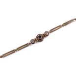 A 14ct gold diamond open work gate link bracelet,