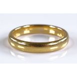A 22ct gold wedding band, size P, 5.6g