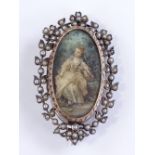 An ivory portrait miniature brooch, depicting a se