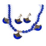 A lapis lazuli bead necklace, with 9ct gold mounts