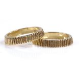 A pair of 18ct Kutchinsky band rings, with ribbed