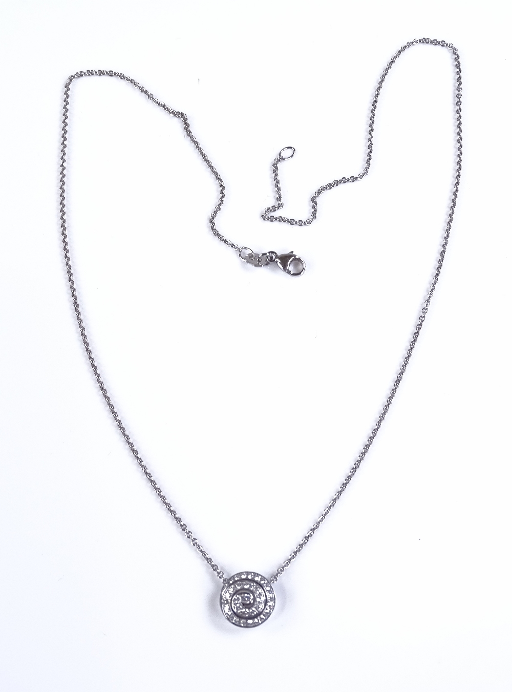 An 18ct white gold diamond swirl pendant, on 18ct - Image 2 of 4