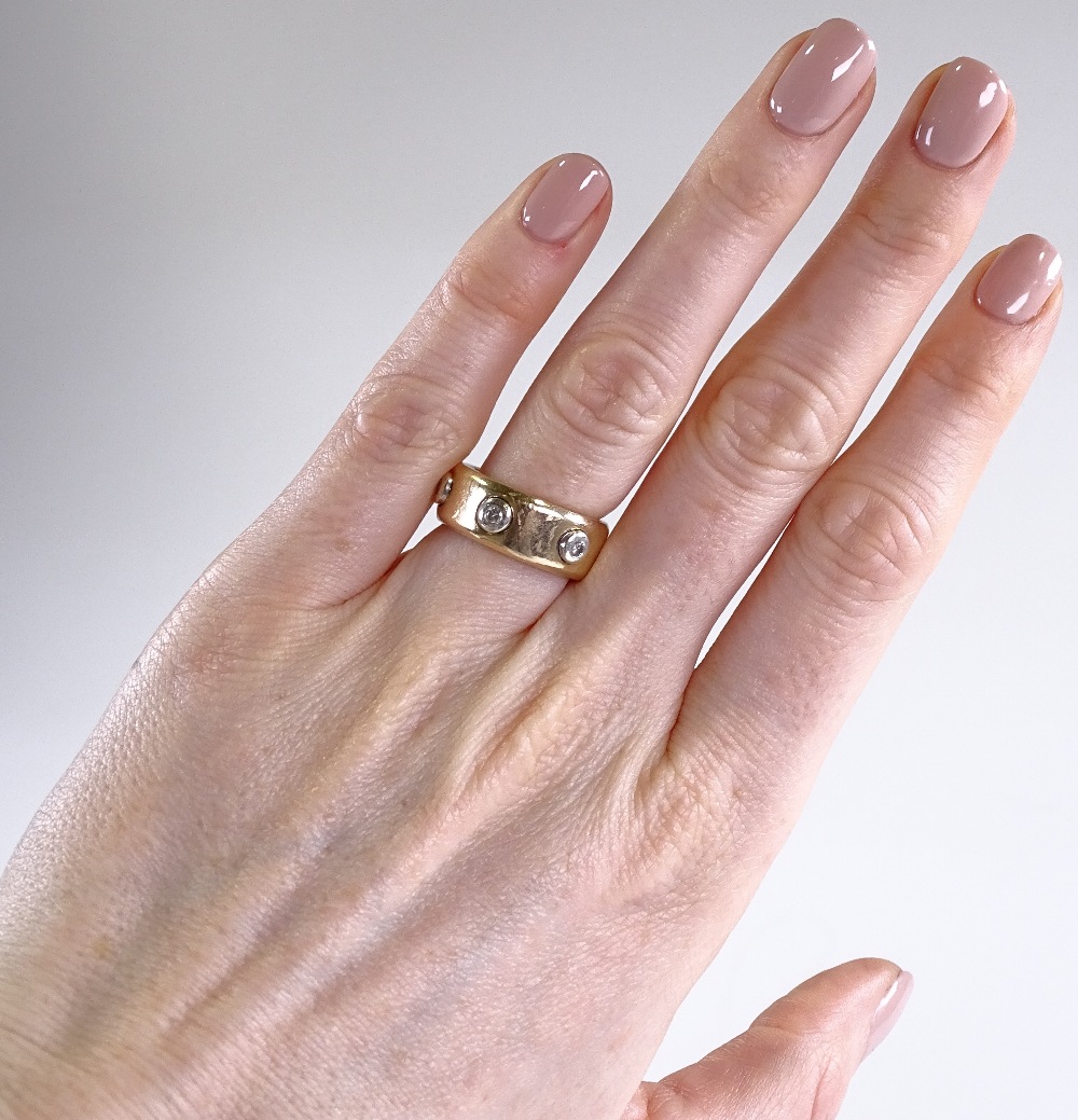 A 9ct gold diamond set band ring, diamond content - Image 4 of 4