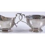 A silver Mappin & Webb sauce boat, together with a
