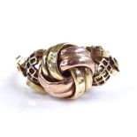 An Austrian 14ct gold knot design ring, setting he