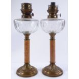 A pair of Victorian cut glass and brass-mounted oi