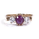 A 9ct gold 3-stone ruby and diamond ring, with cen