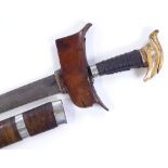 A large Malayan Kris dagger, with carved elephant'