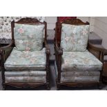 A pair of carved walnut-framed Bergere armchairs,