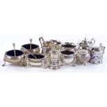 Various silver cruets, some with blue glass liners