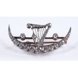 A fine quality 18ct gold diamond set crescent tiar