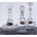 3 various cut glass decanters with silver labels