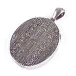 A Victorian silver locket pendant, with chased and