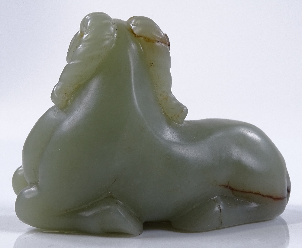 A Chinese green jade carving of a reclining goat, - Image 2 of 3