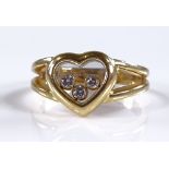 An 18ct gold Chopard Happy Diamonds ring, heart-sh