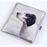 A silver plated cigarette case, with enamelled dog