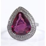 A 14ct white gold ruby and diamond cluster ring, p