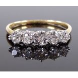 An 18ct gold 5-stone diamond ring, setting height