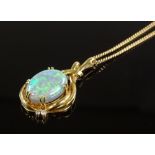 An 18ct gold black opal and diamond stylised penda