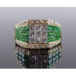 An 18ct gold emerald and diamond cluster ring, set