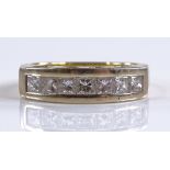 An 18ct gold 7-stone diamond ring, set with Prince