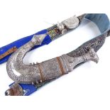 A Middle Eastern jambiya knife, with ornate white