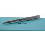 A Tiffany silver coin edge pattern ballpoint pen,