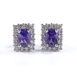 A pair of silver amethyst and CZ cluster earrings,