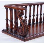 A reproduction mahogany desktop book rack, with ca