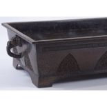 A Chinese rectangular bronze planter, relief mould