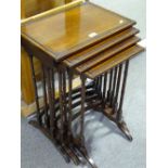 A nest of 4 Edwardian mahogany occasional tables,