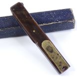 A Victorian brass and horn-handled quill cutter /
