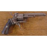 A 19th century pinfire revolver, mounted on oak pl