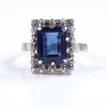 An 18ct white gold sapphire and CZ cluster ring, s