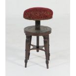 Mahogany and stained beech revolving music stool,