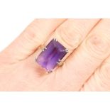 Amethyst dress ring, rectangular cut stone of approx.