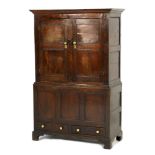 Welsh joined oak press cupboard, Denbighshire, first quarter 18th Century, with later additions,