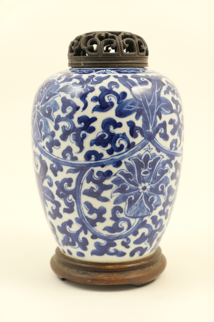 Chinese blue and white jar, 18th Century, ovoid form with pierced wooden cover,