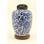 Chinese blue and white jar, 18th Century, ovoid form with pierced wooden cover,