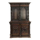 Late Victorian carved oak library bookcase in the Flemish style,