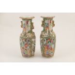 Pair of Cantonese famille rose vases, late 19th Century, ovoid form with a waisted neck,