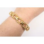 18ct gold textured open link bracelet, length 18.5cm, weight approx. 14.