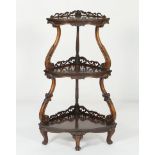 Early Victorian rosewood corner whatnot, circa 1840, having three shelves,